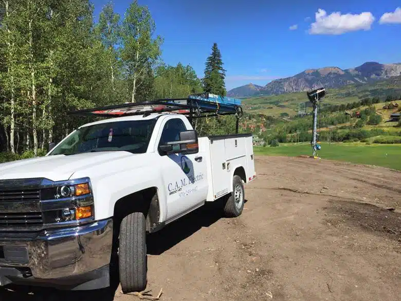 CAM Work truck on site in Telluride installing solar